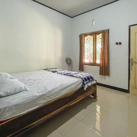 Ekas Beach Guesthouse Mitra Reddoorz Экстерьер фото