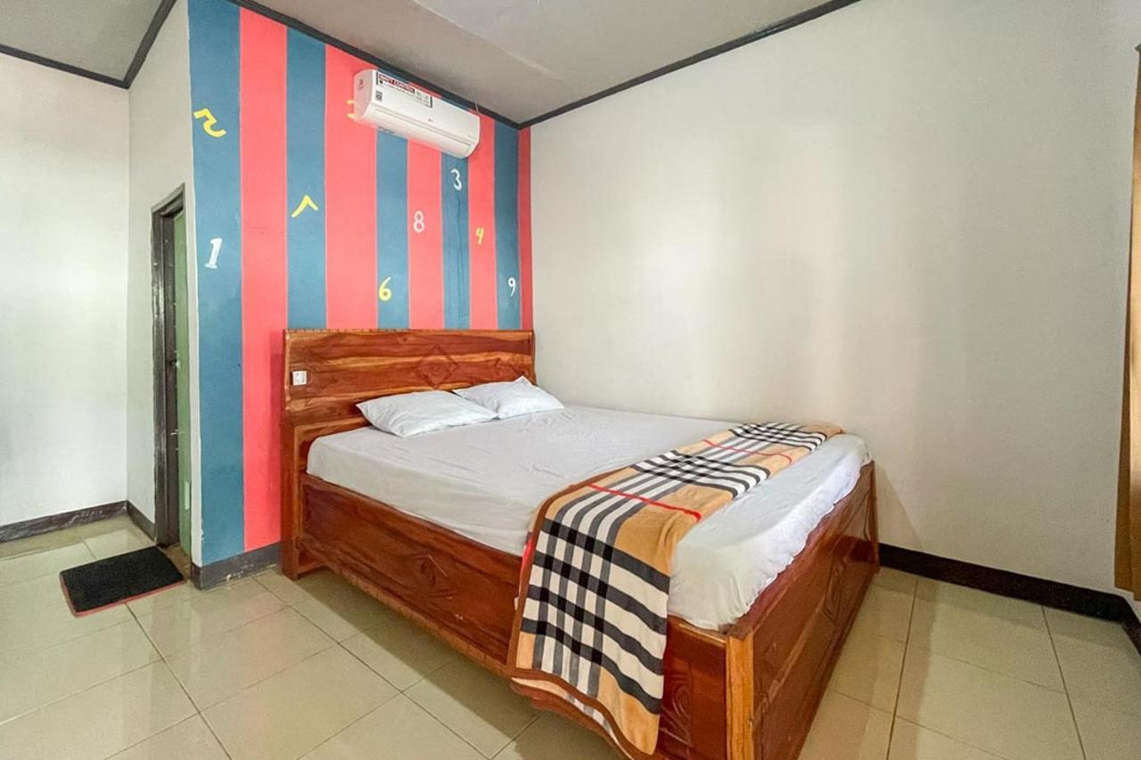 Ekas Beach Guesthouse Mitra Reddoorz Экстерьер фото